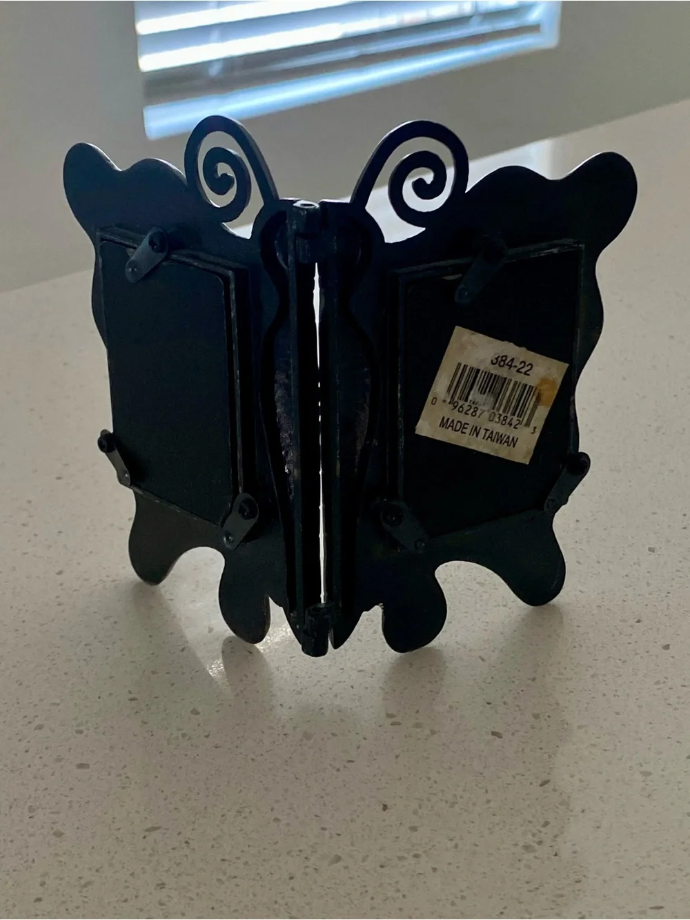 Double vintage photo frame with butterfly design; miniature model